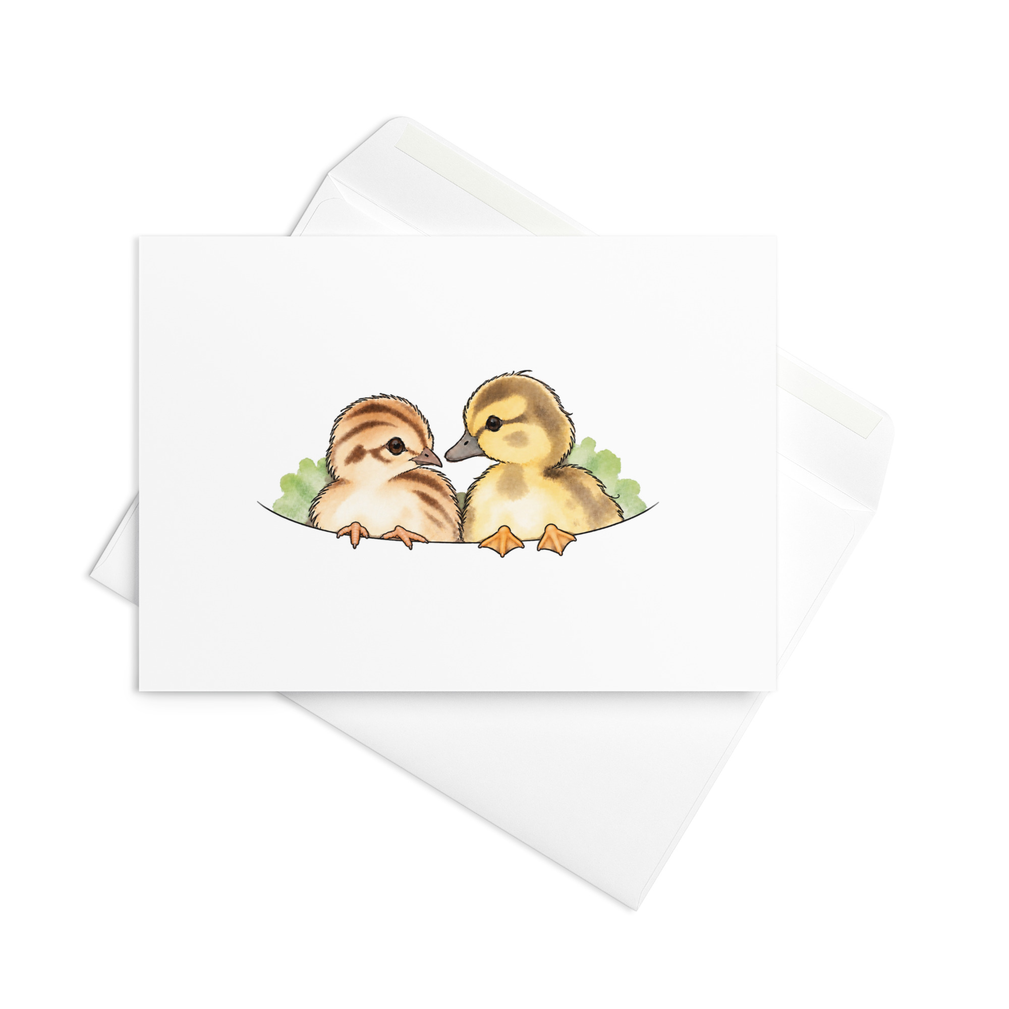 Klappkarte mit Duffy und Pauline in der Brusttasche auf einem Umschlag